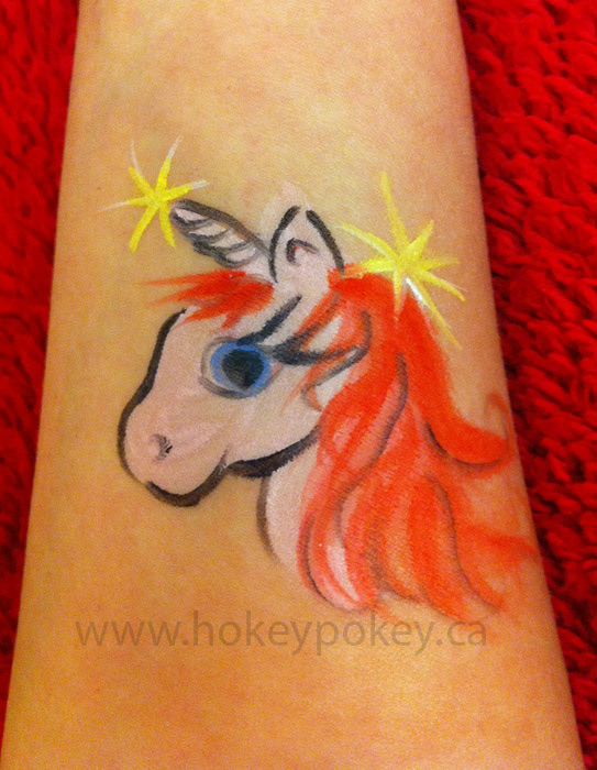 Arm Cheek Painting Galery. Face Painting Toronto. Face Painter Toronto