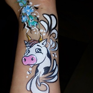 arm flower cow painting
