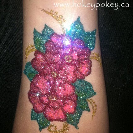 Free hand glitter tattoo flower
