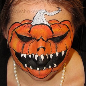 holiday face painting scary pumpkin